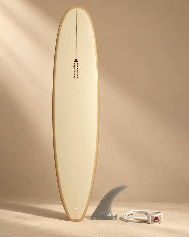 Earth and berry surfboard with coordinating fin and leash