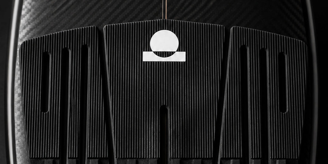 Black Summer vibes traction pad on a surfboard tail