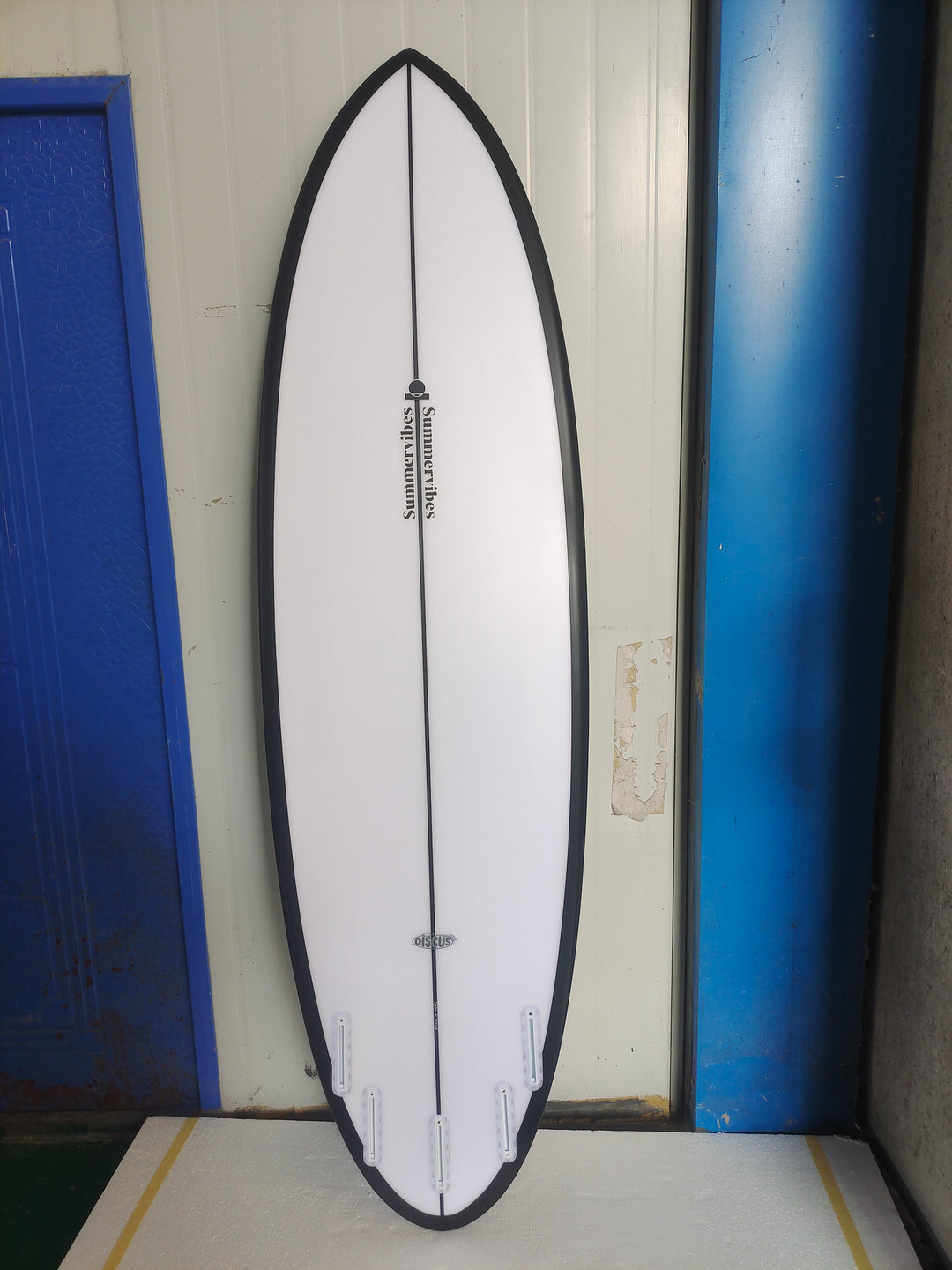Summer vibes Discus Black Rail Spray surfboard bottom view