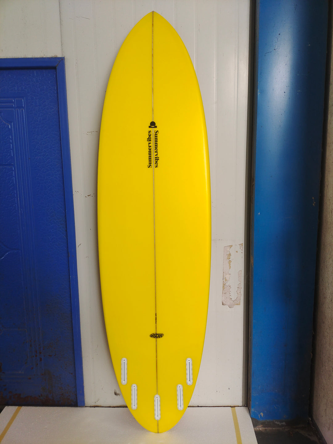 Summer vibes Discus Orange Yellow surfboard bottom view
