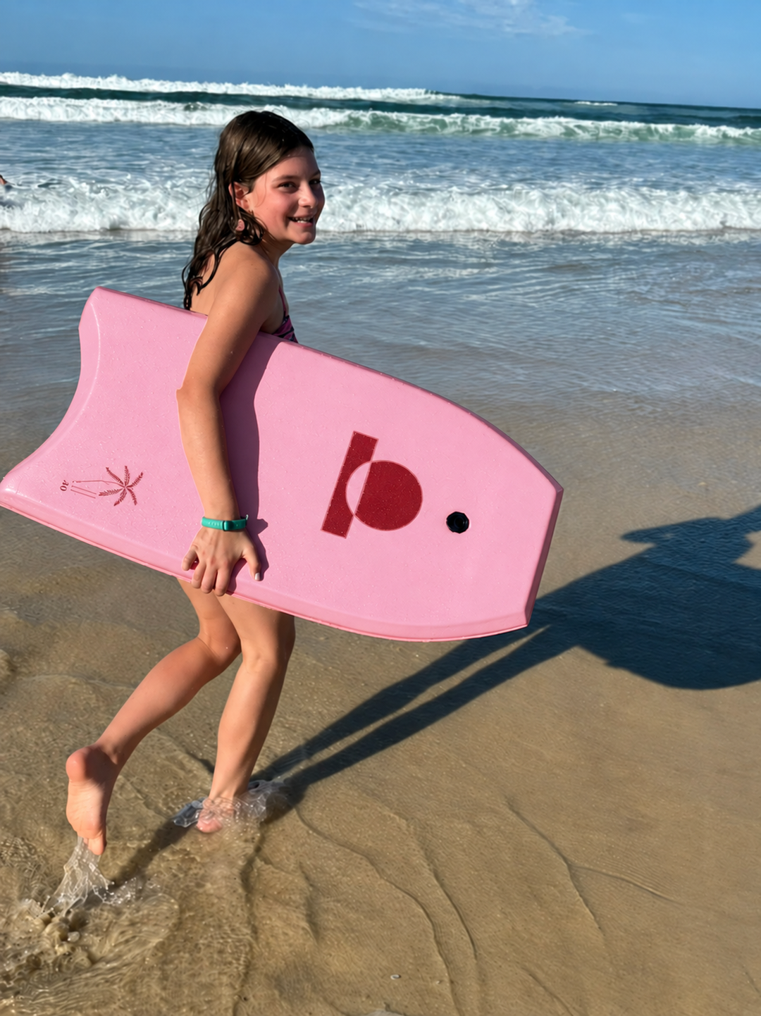 Summer vibes Pink White bodyboard on the beach