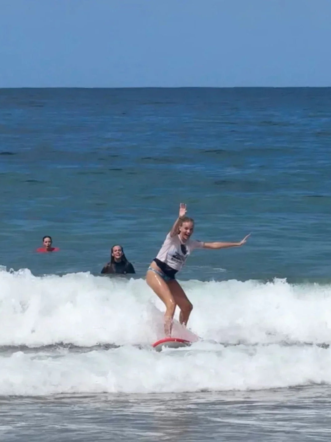 Surfing a Summer vibes softboard in small waves