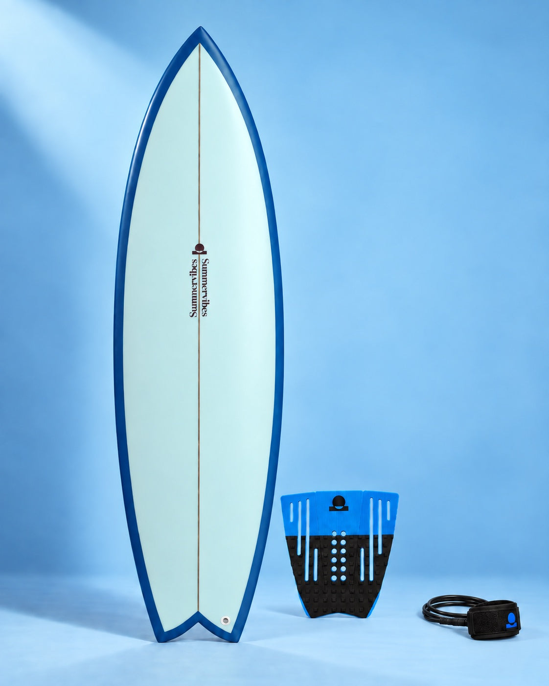 Blue rail fish surfboard with blue and black traction pad and leash